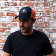 Load image into Gallery viewer, Halesite Habanero Embroidered Bio-washed Trucker Cap, Black/Orange, Adjustable Velcro Back